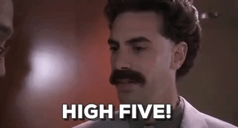 Borat giving somebody a high five.
